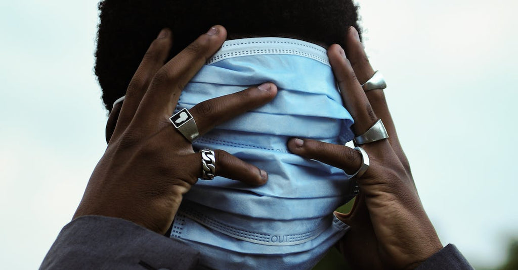 What causes black men alopecia?