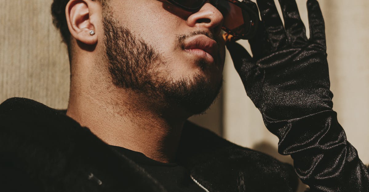 What causes balding spots on the head?